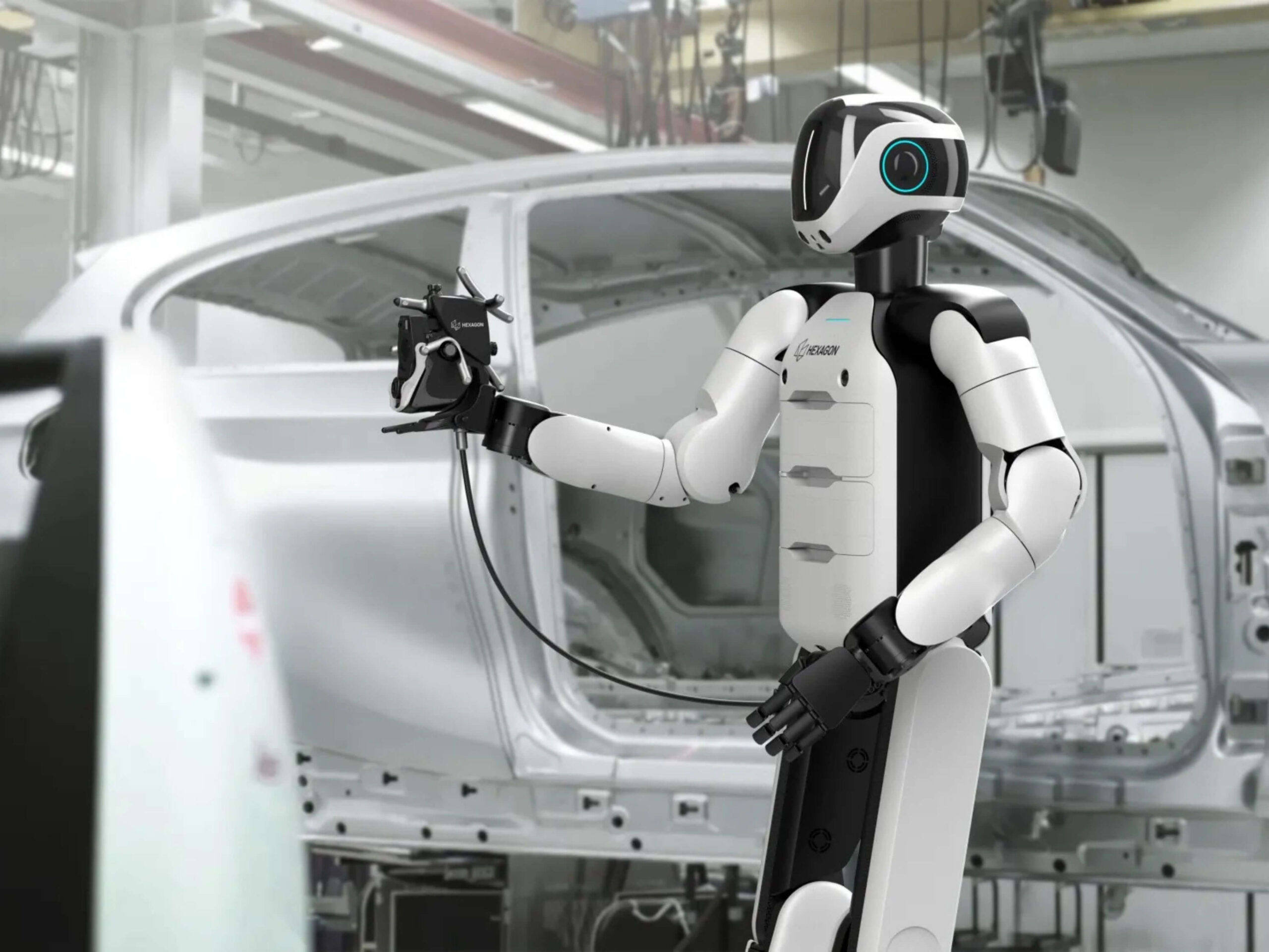 AEON inspecting car pieces at a factory